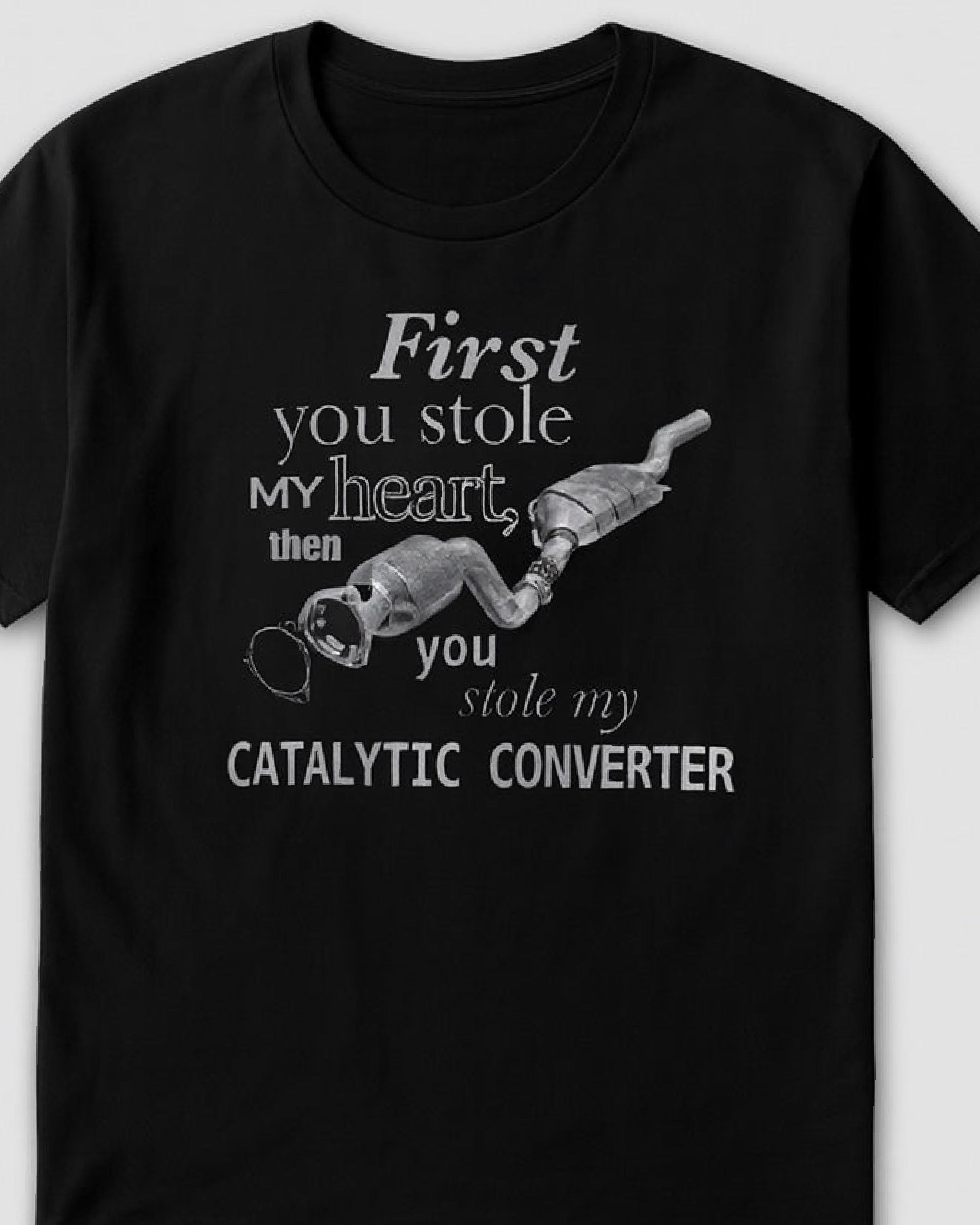 Black t-shirt with graphic and text on a white background