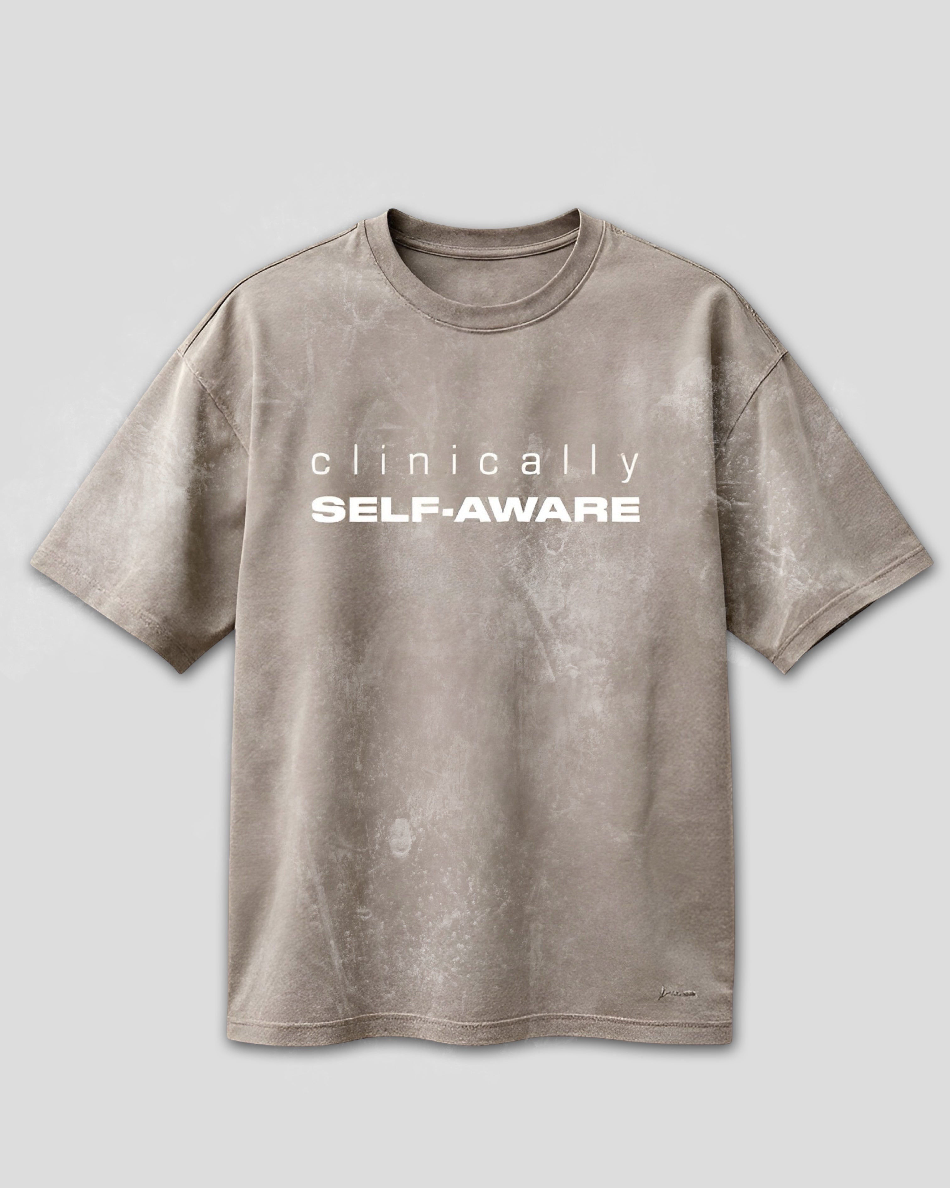 coffee color t-shirt with 'clinically SELF-AWARE' text on a light gray background