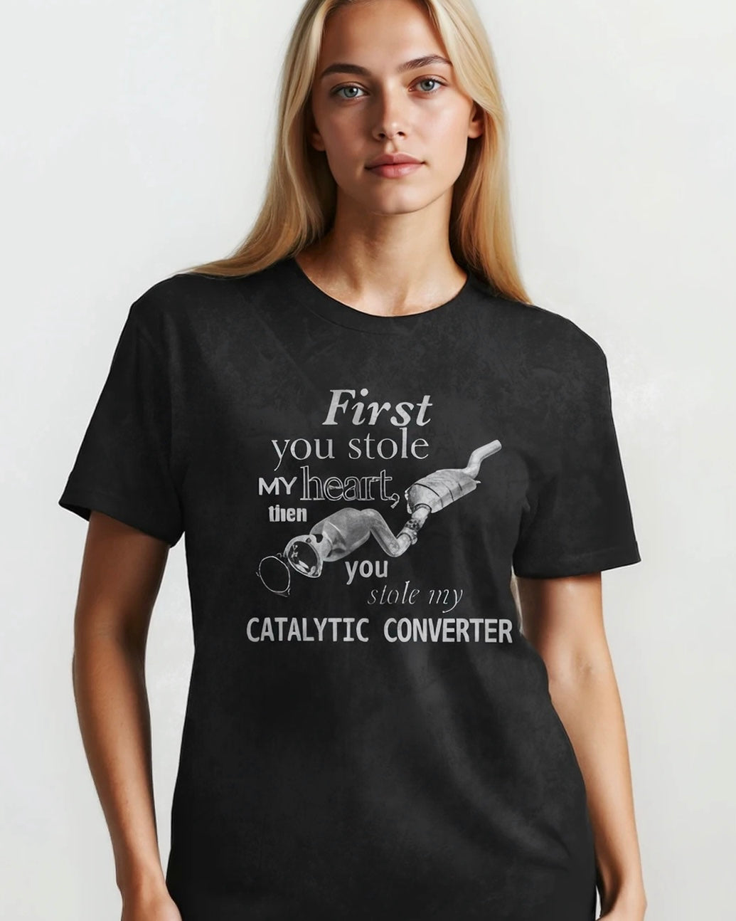 Person wearing a black t-shirt with a humorous graphic and text.