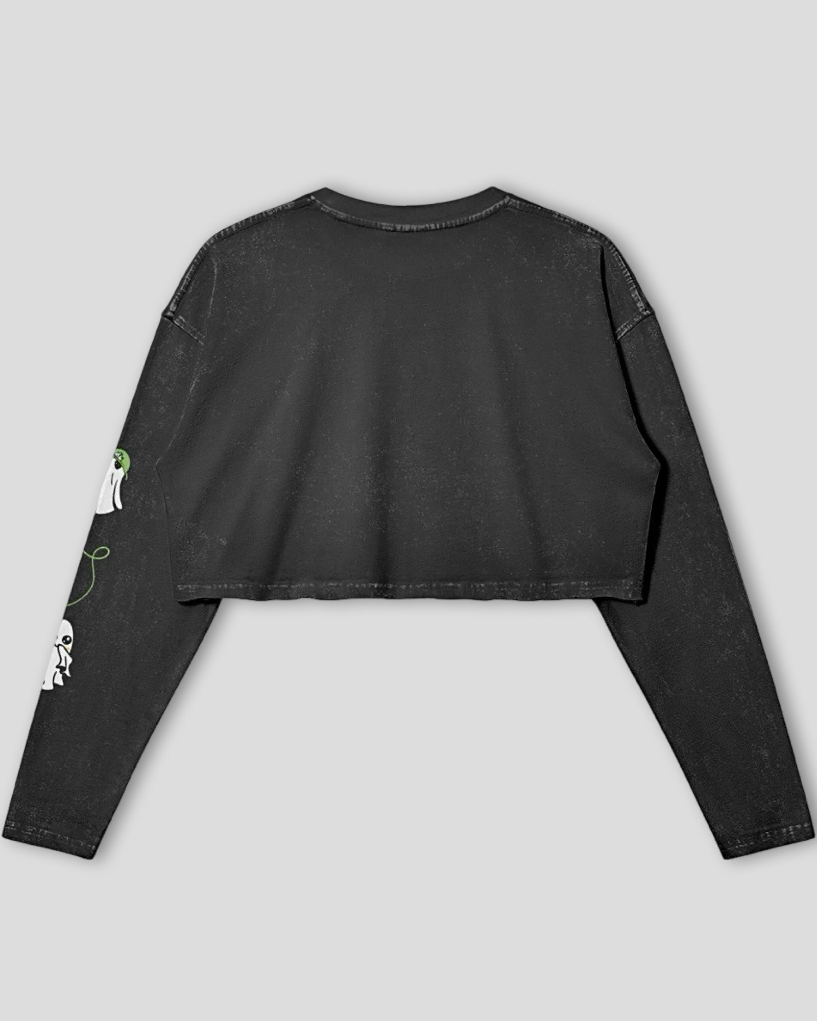 Black long-sleeve crop top with ghost designs on arm on a light gray background