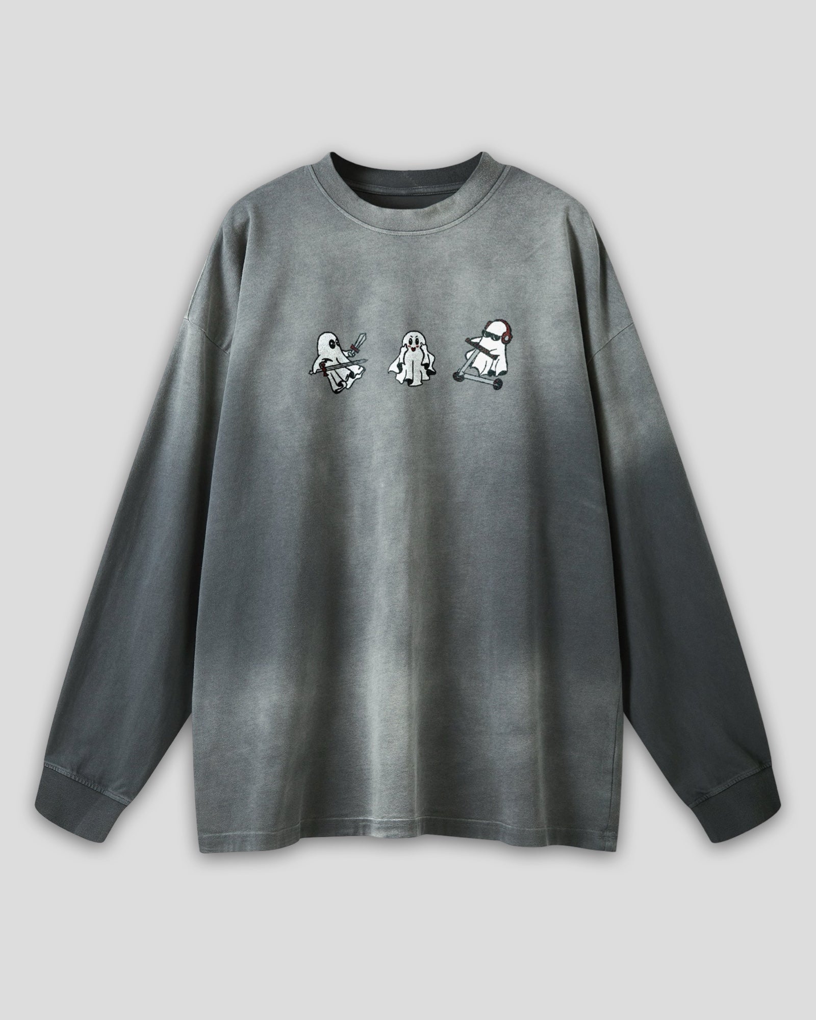 flat lay image of a long sleeve grey vintage washed heavyweight cotton t shirt with embroidered original ghost graphics and a small t&a logo against a white background