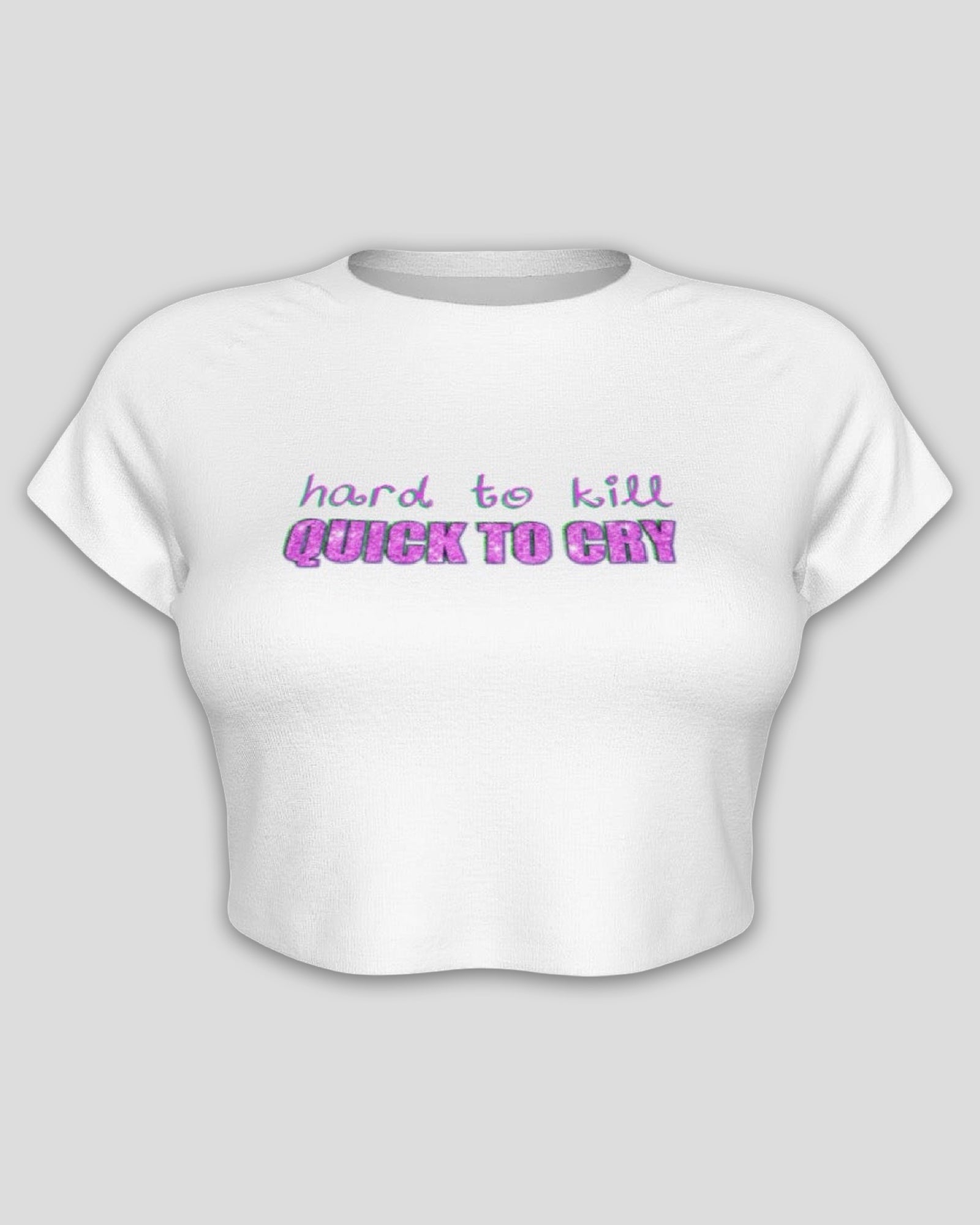front view of a white raglan sleeve microfiber cropped baby tee with pink and green text lettering that reads 