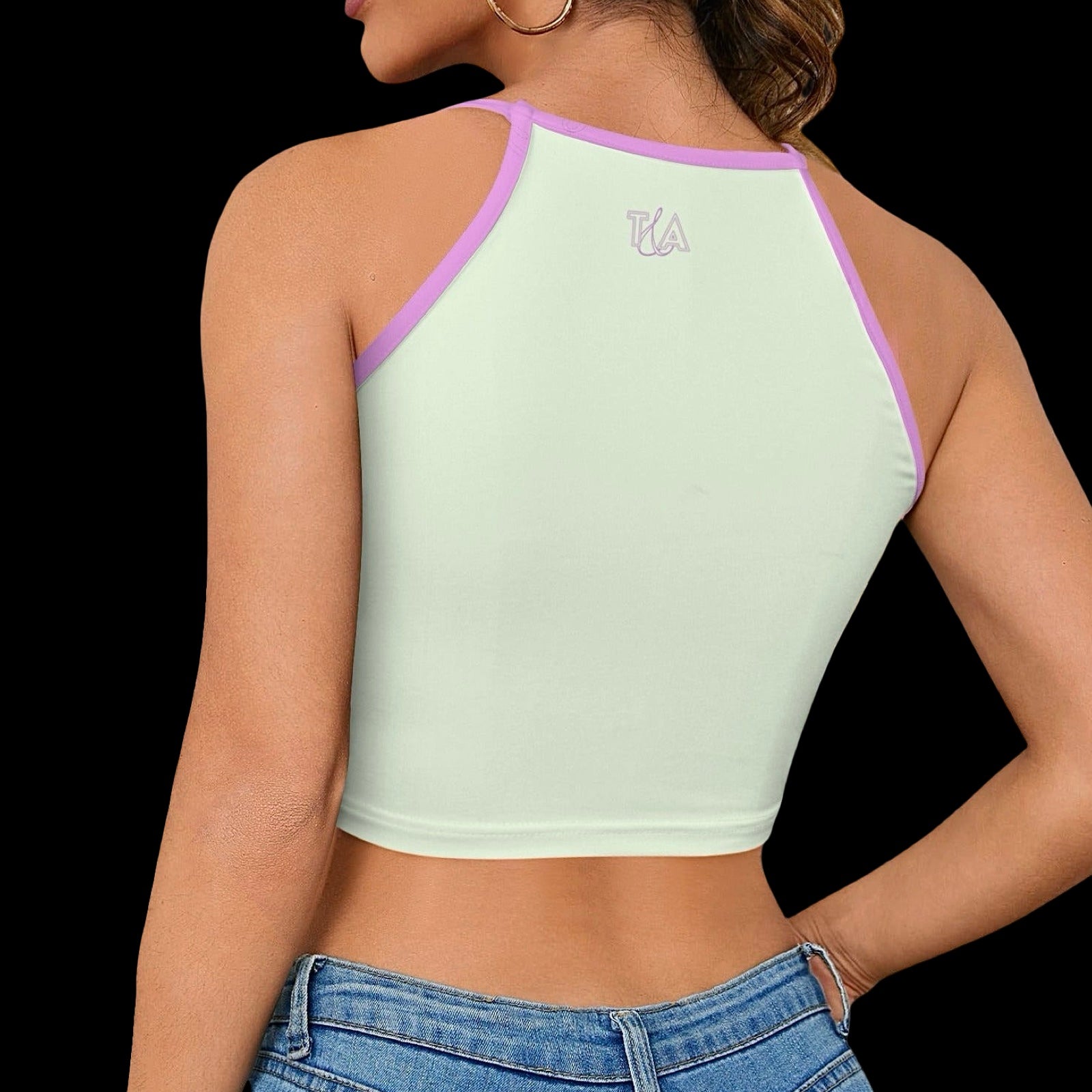 back view of a woman wearing light green crop halter top with baby pink trim featuring a small pink T&A logo