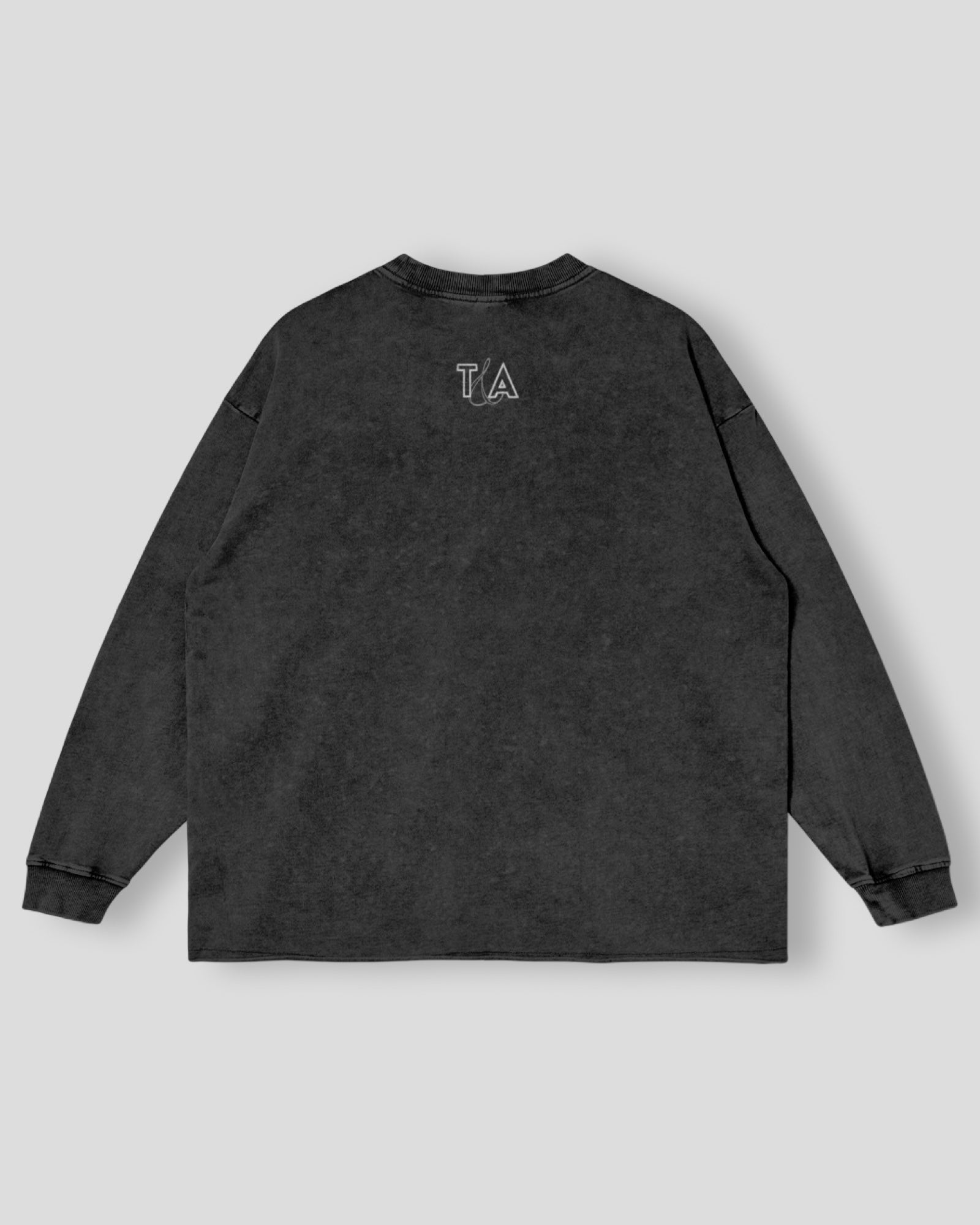 Black long-sleeve shirt with the T&A logo on a light gray background