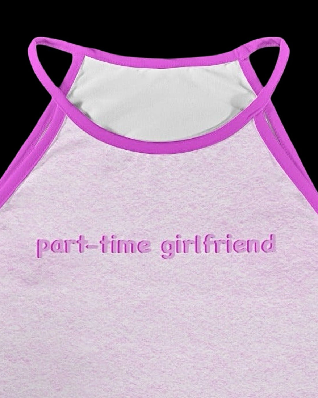 Flat lay image of a light pink halter crop top with contrast trim and text graphic that reads 