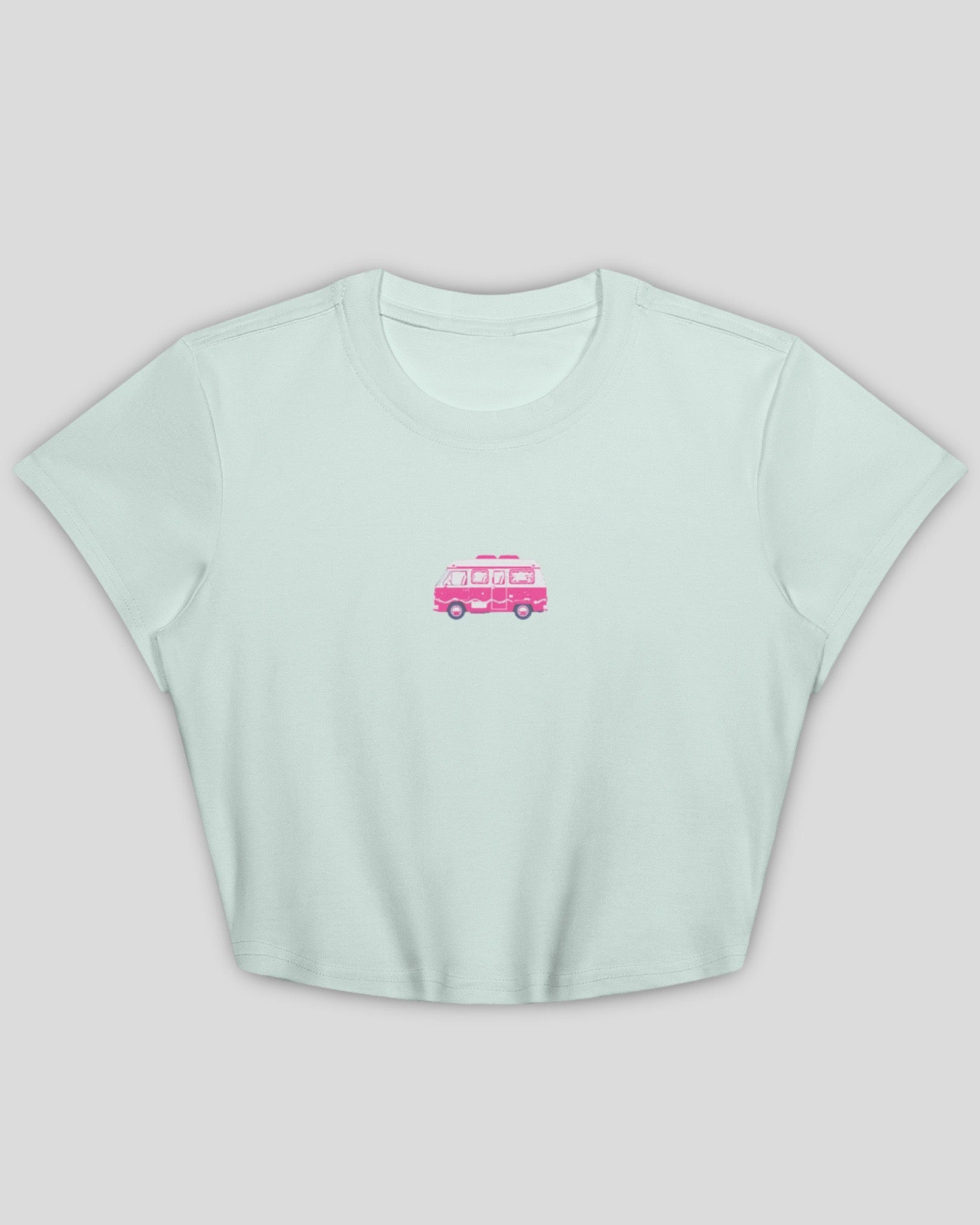 flat lay image of a light blue crop cotton baby tee with an embroidered design of a pink camper van against a white background