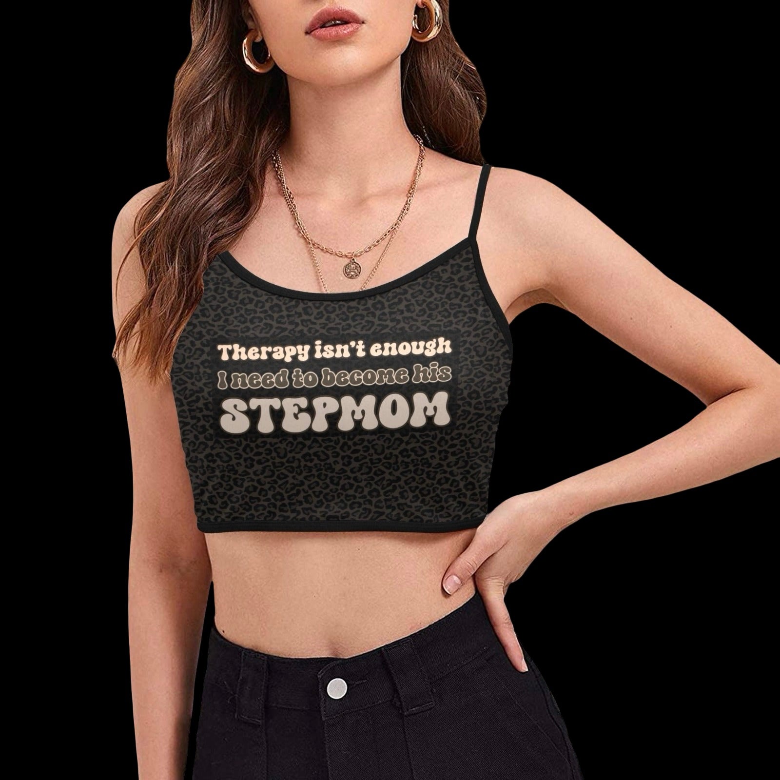 front view of woman wearing a dark brown leopard print spaghetti strap cami crop top with text graphic that reads 